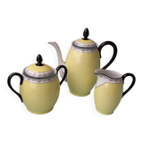 Coffee pot or teapot, sugar bowl and milk jug in porcelain.