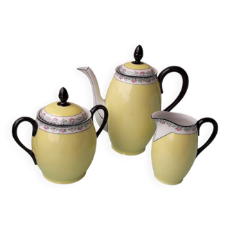 Coffee pot or teapot, sugar bowl and milk jug in porcelain.