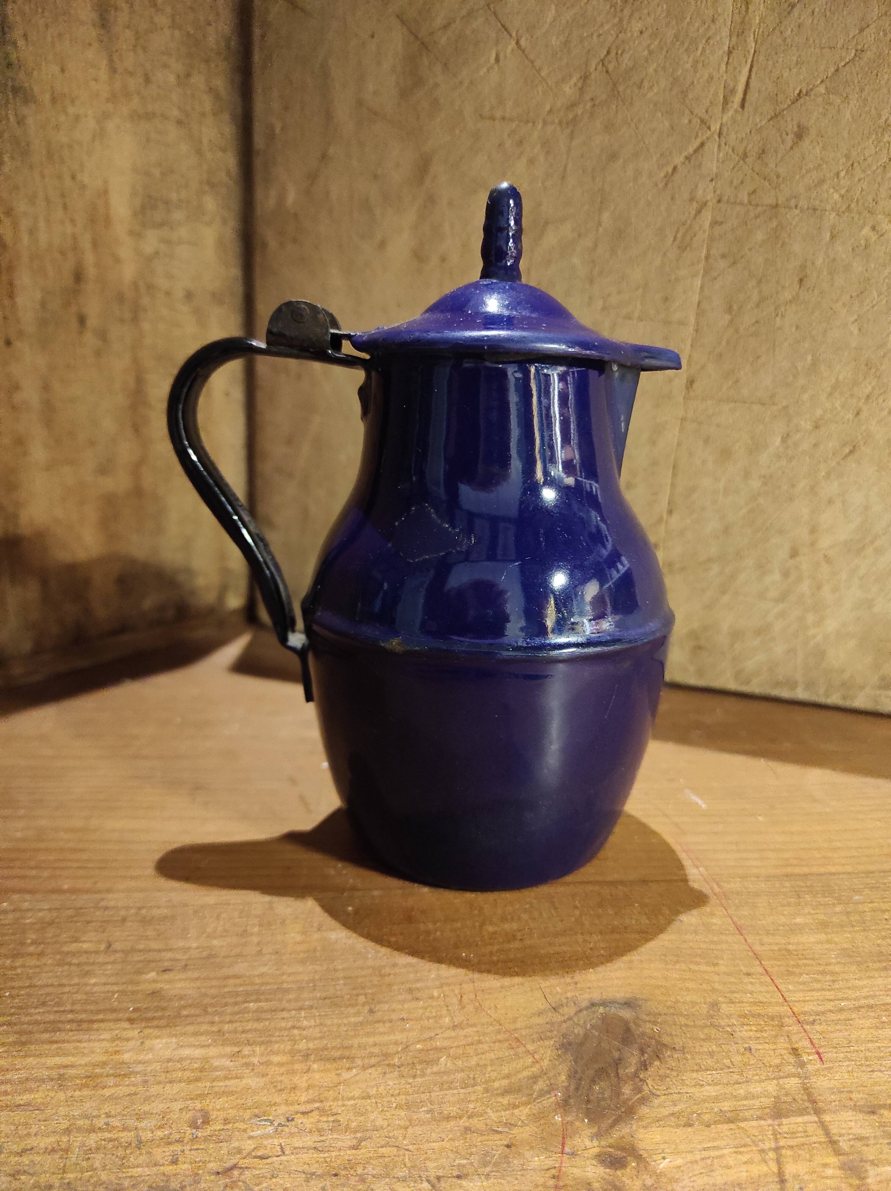Small vintage French jug with lid, in blue enamel