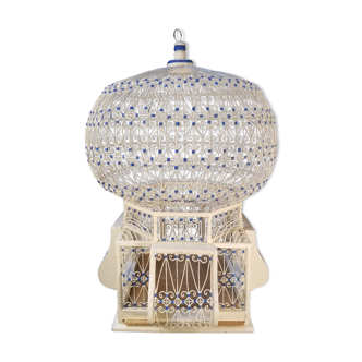 Vintage hanging bird cage in oriental style
