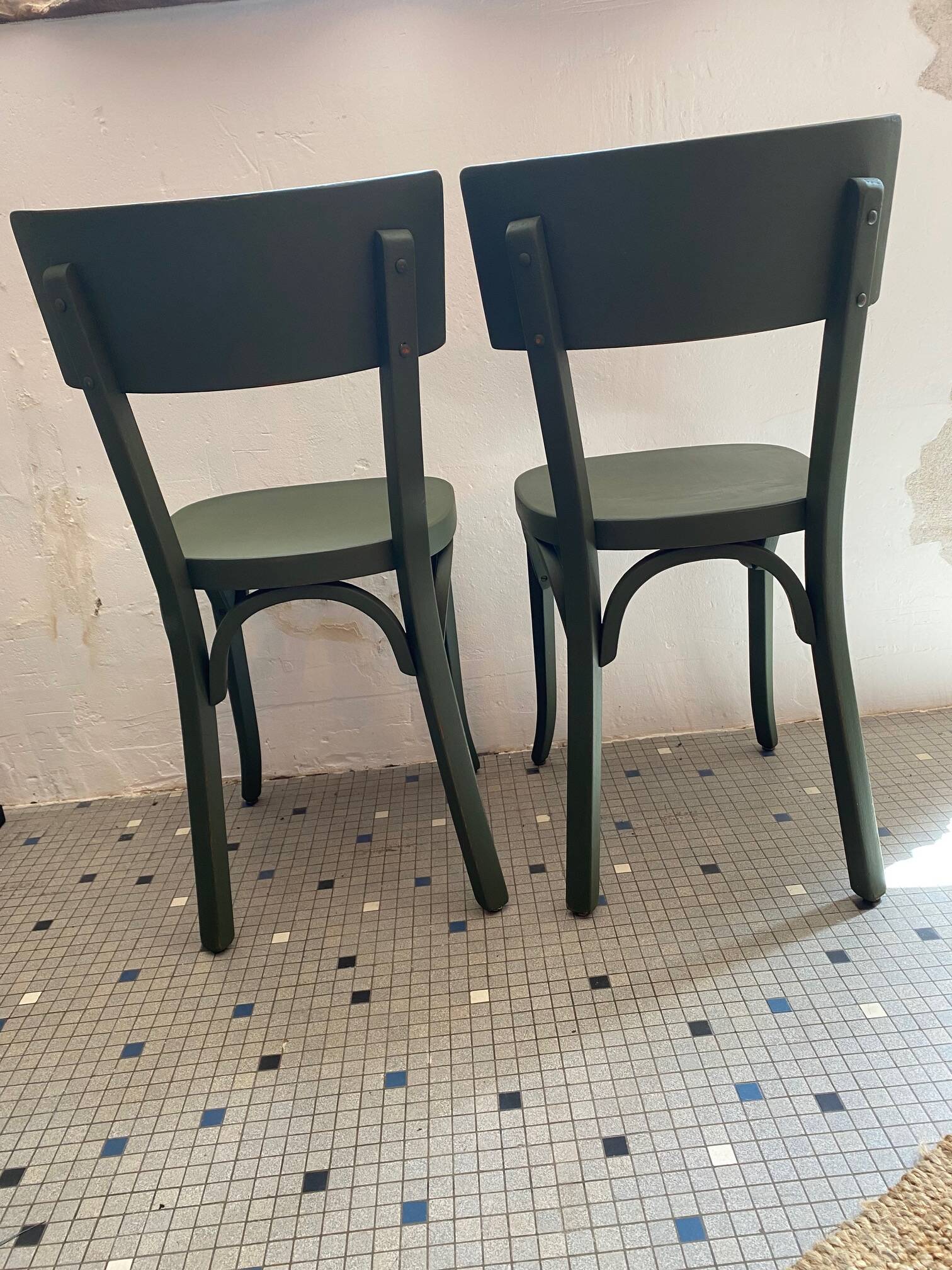 Pair of Baumann bottle green bistro chairs