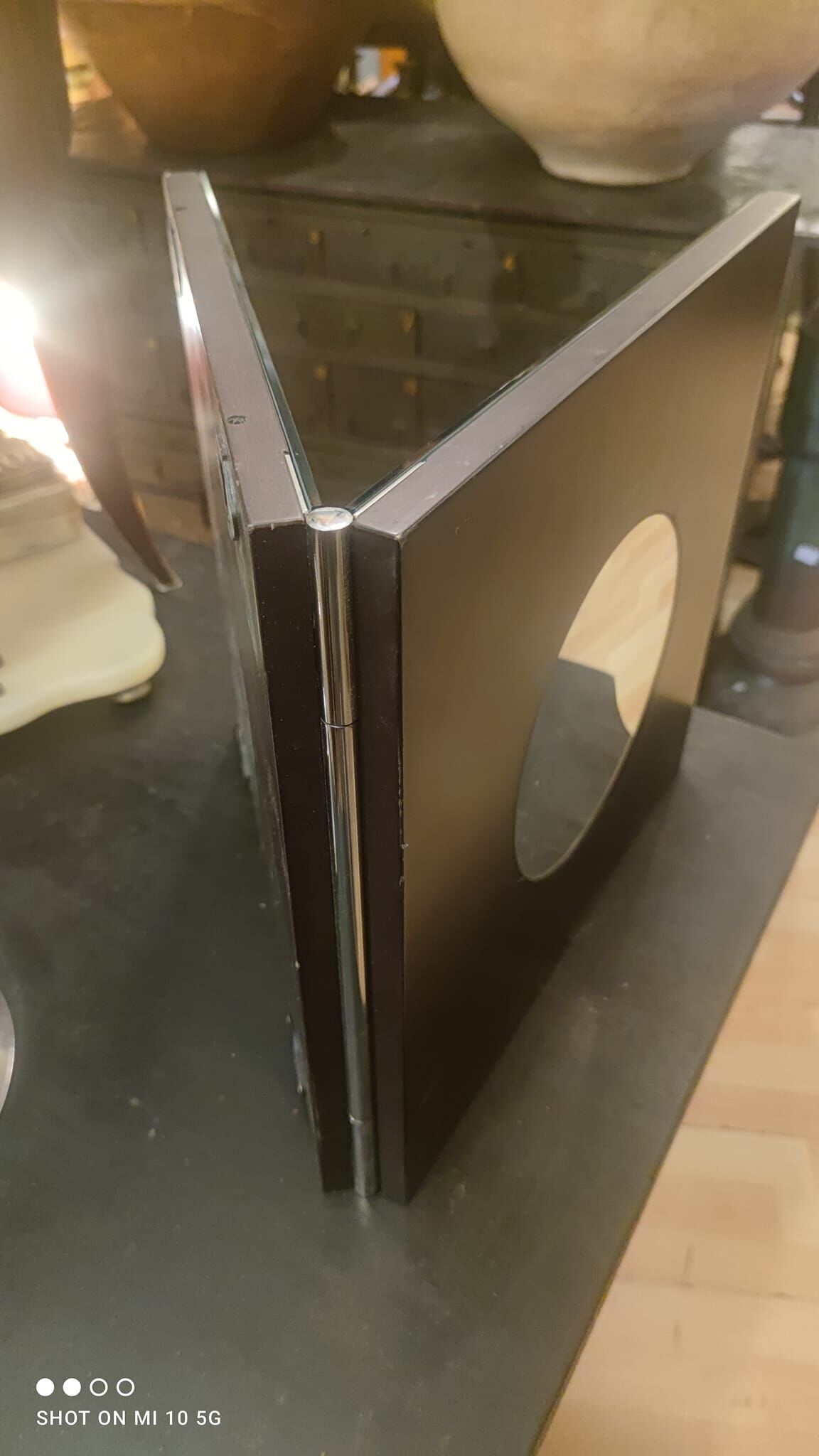 Wall mirror with a wooden frame and Wenge finish, dating from the late 19th century