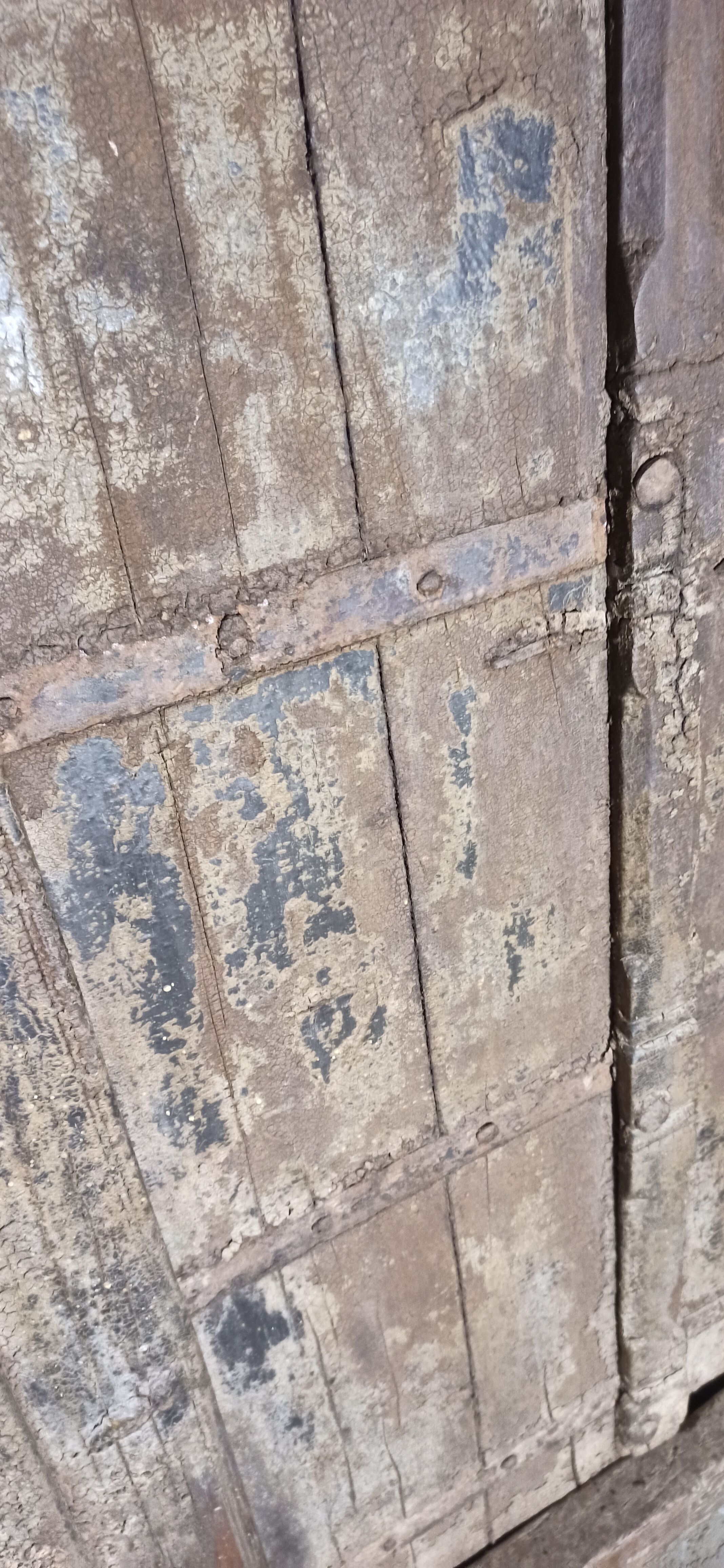 Old wooden door with frame