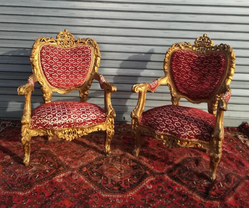 pair of gilded wooden ceremonial chairs