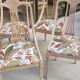 4 vintage wooden chairs sanded and reupholstered.