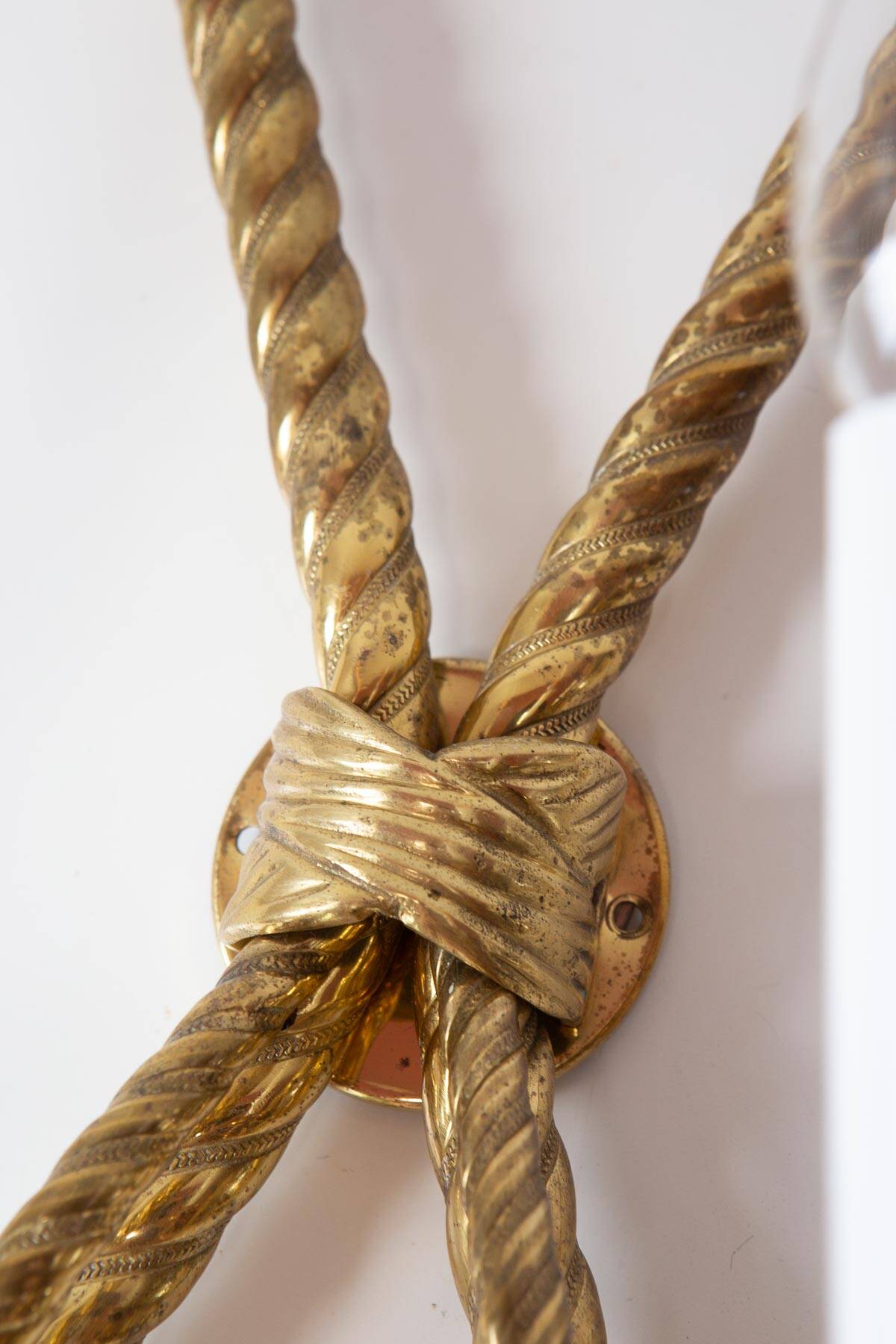 Pair of large gilded brass Noeud wall lights