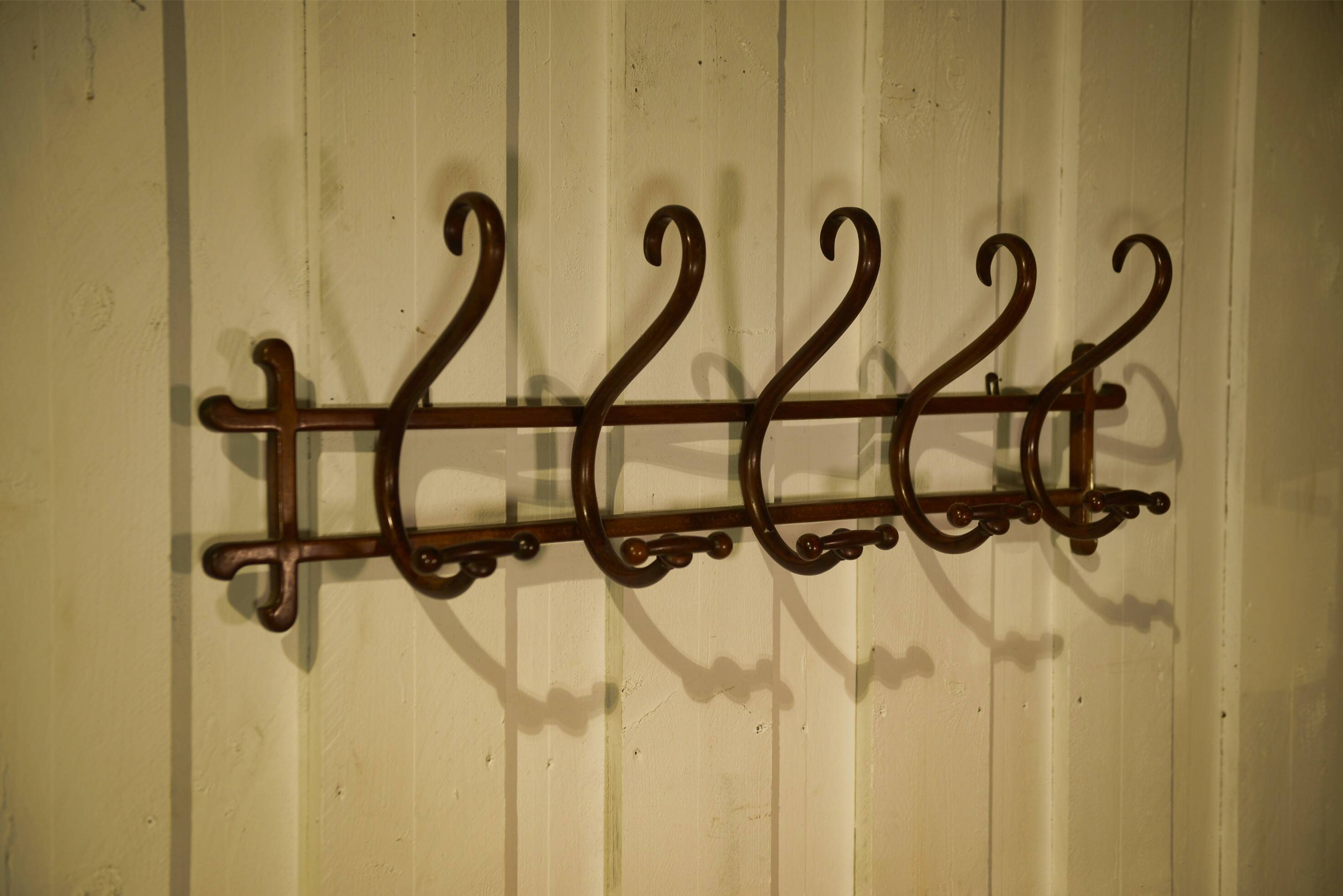 Curved beech wall coat rack published by Thonet, 1930s.
