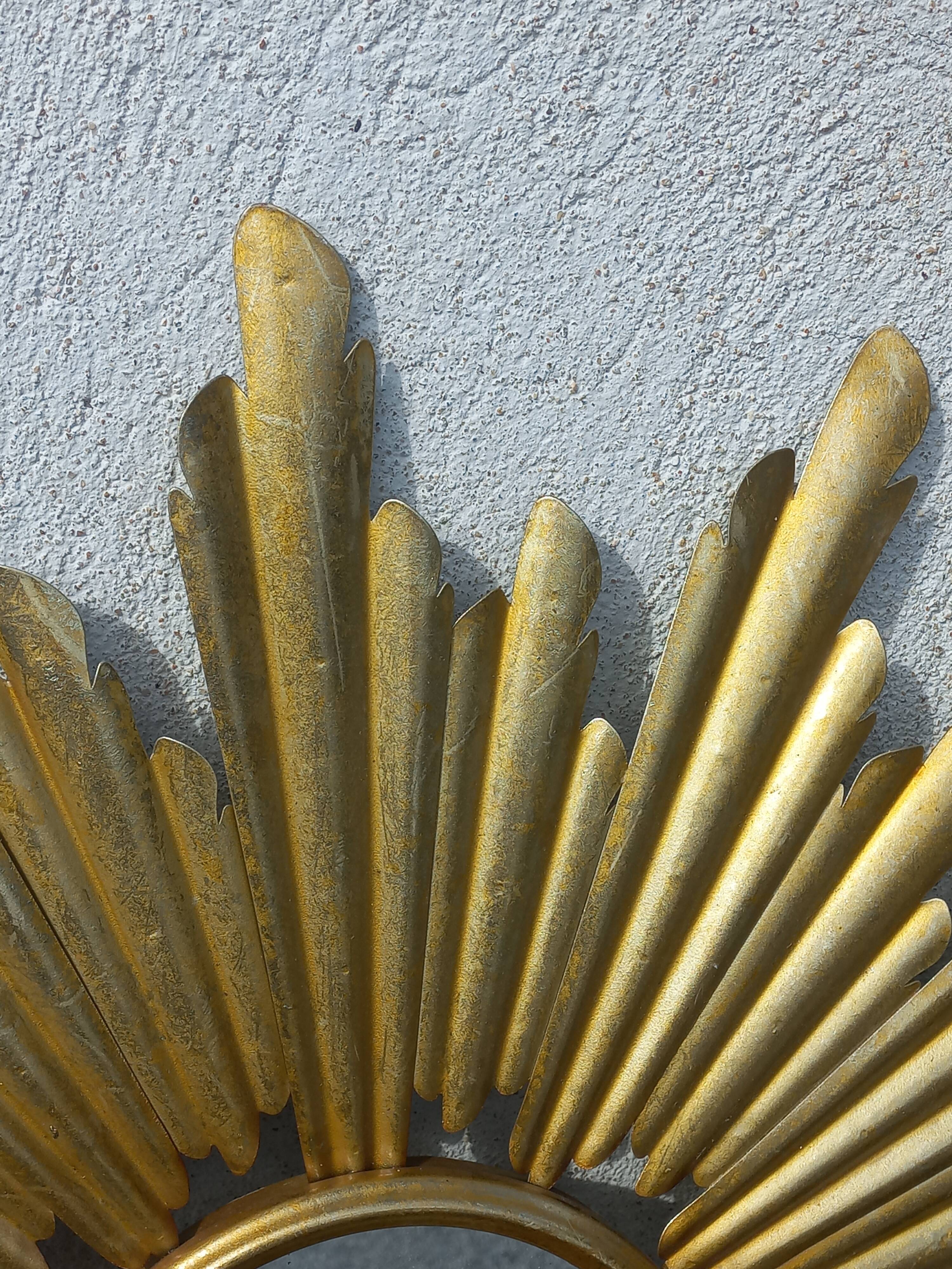 Gold metal sun mirror