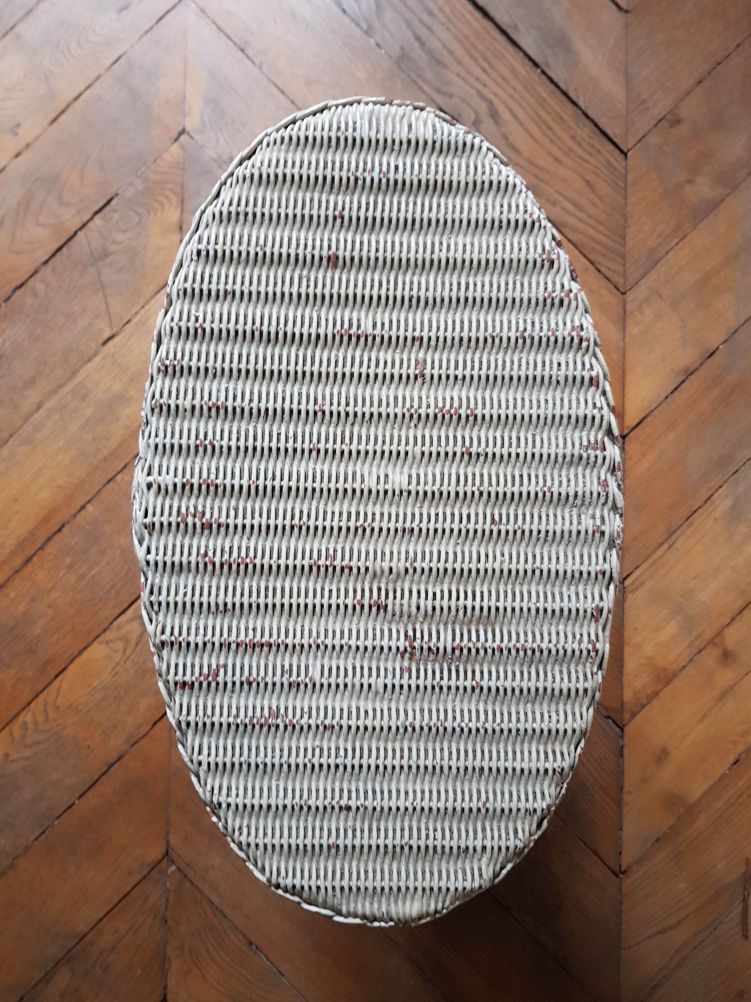 White lacquered wicker laundry box