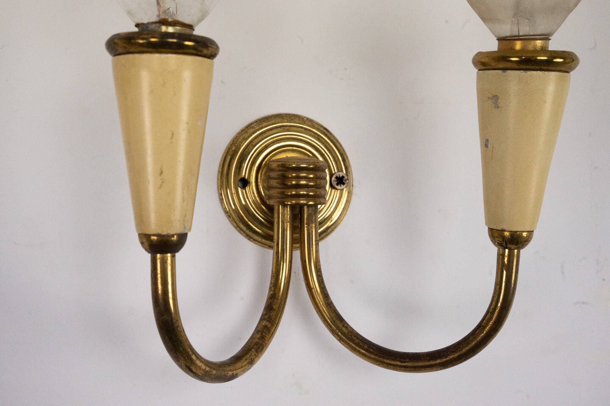 Set of four Mid-Century sconces in lacquer and brass. Italy 1950s