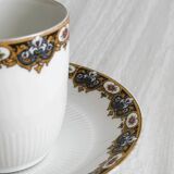 7 Limoges porcelain cups and saucers with gold decoration and floral motif.