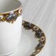 7 Limoges porcelain cups and saucers with gold decoration and floral motif.