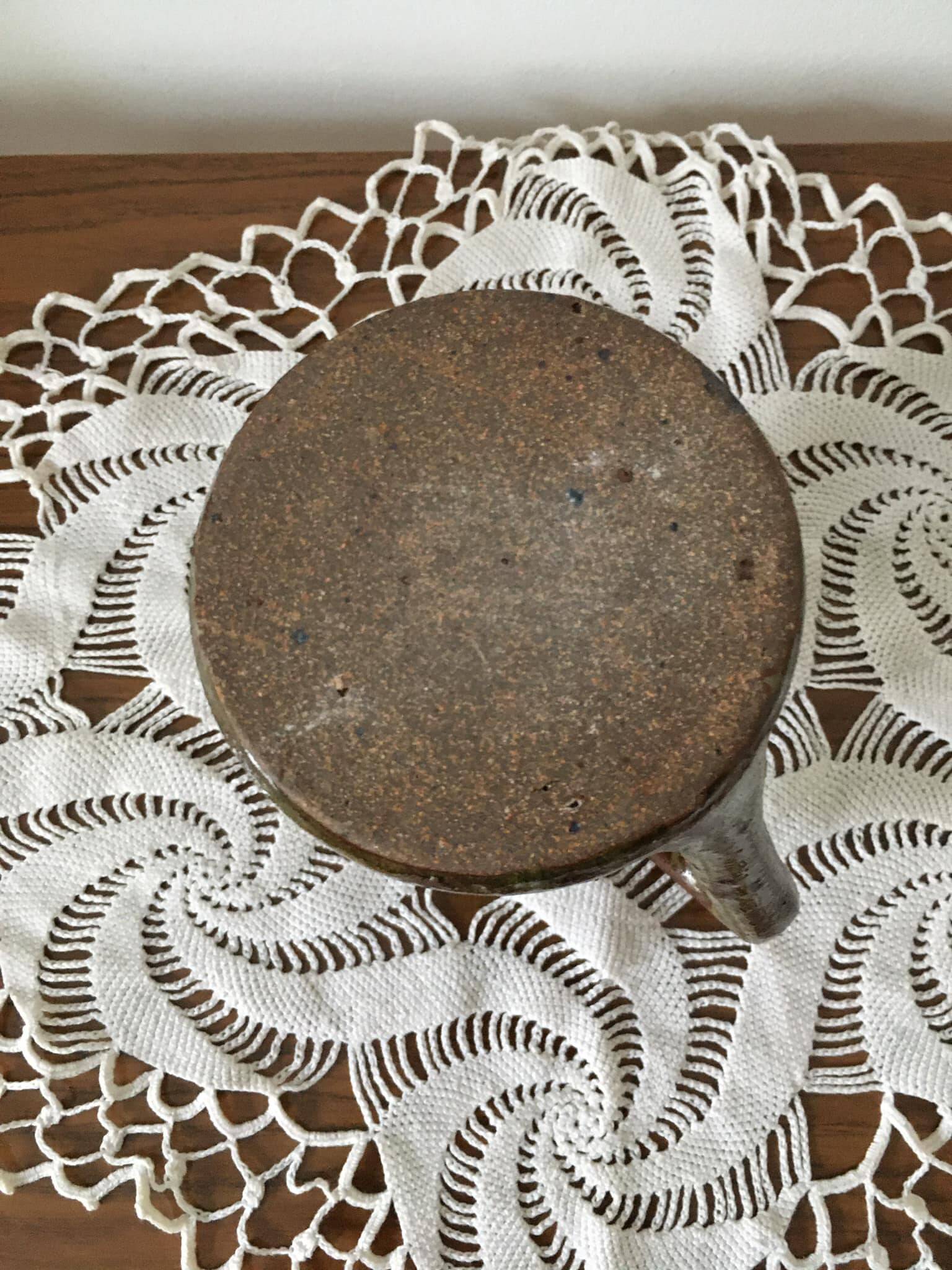 Brown stoneware tealight holder with handle