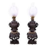 Paire de lampes à huile en bronze, France, vers 1880.