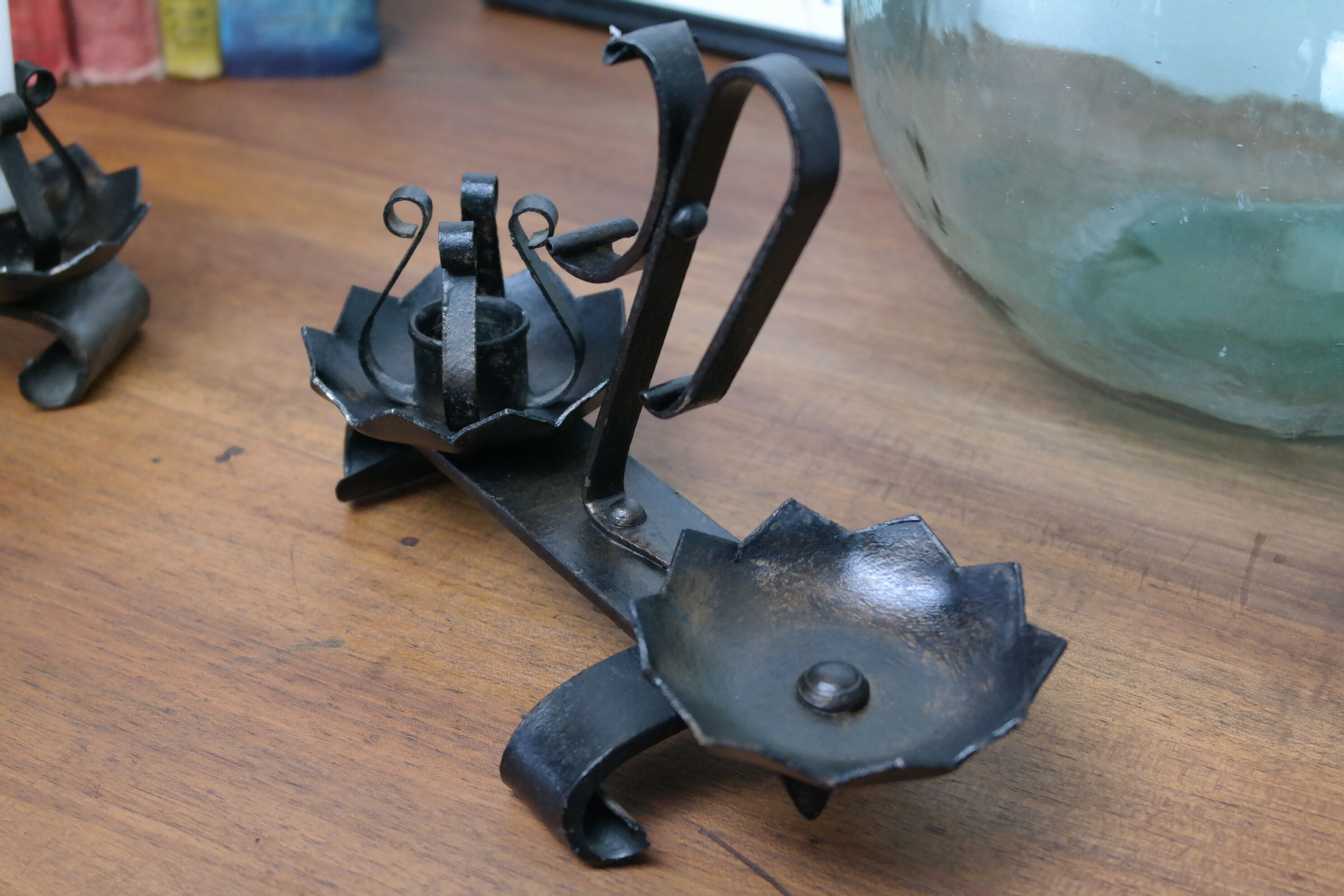 Old turned wrought iron candlesticks