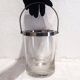 Glass and silver metal ice bucket