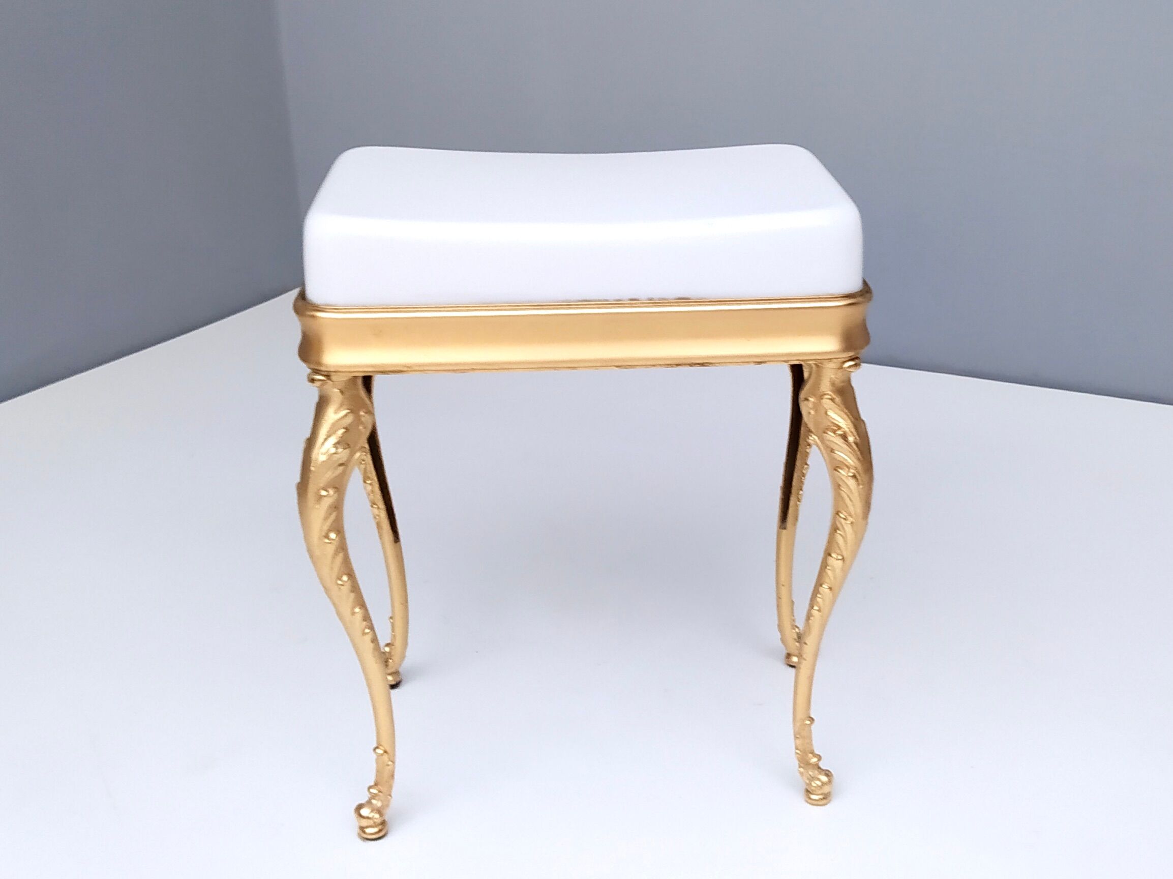 Midcentury White Plastic Seat Ottoman with Cast Brass Legs, Italy