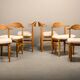 Henning Kjærnulf dining chairs set in Oak and Sheepskin, Denmark, 1960s