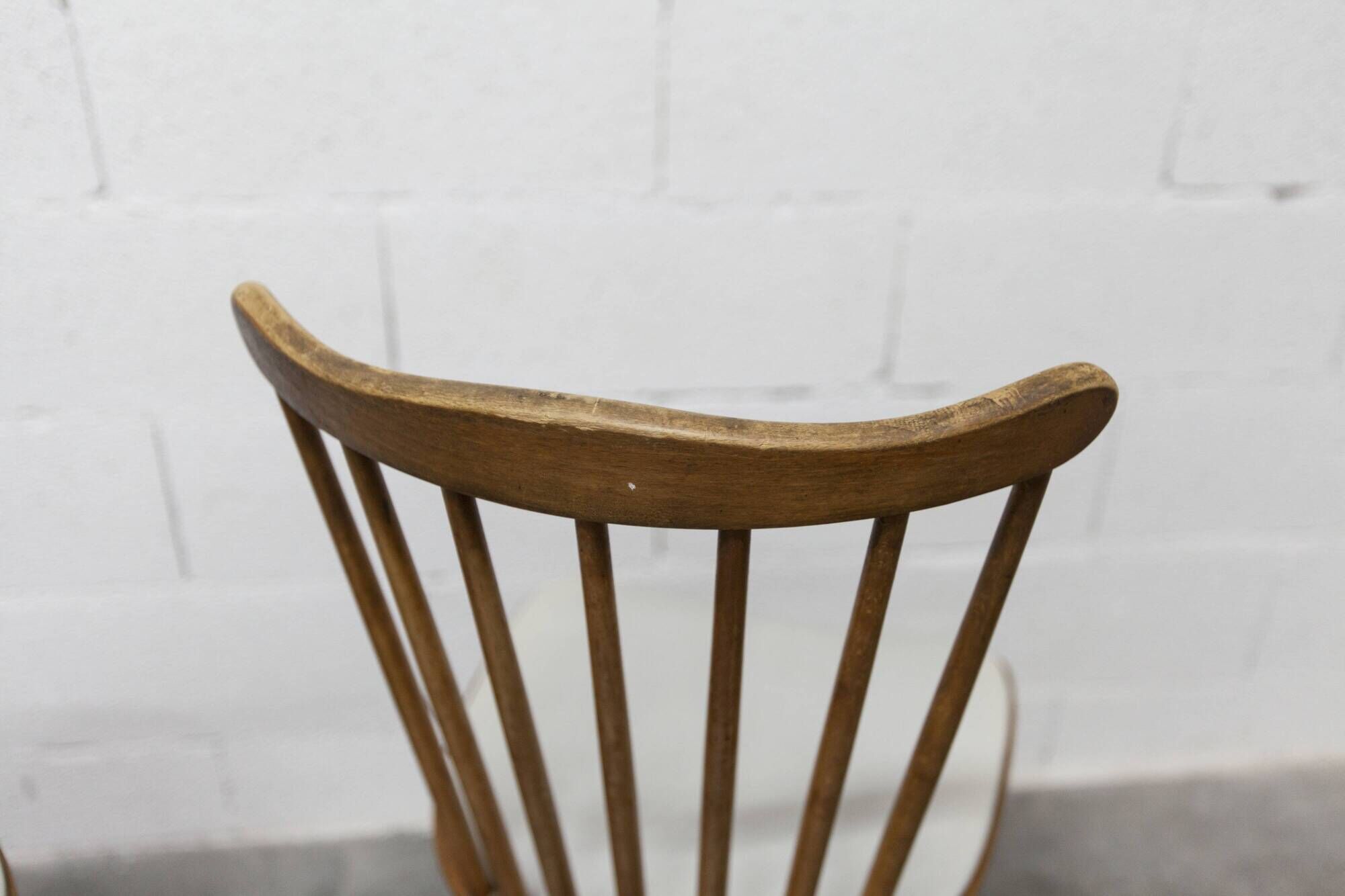 Pair of Baumann Menuet chairs, Honey patina, White skai seat