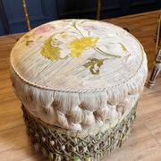 Napoleon III period ottoman in original upworked fabric with wheels