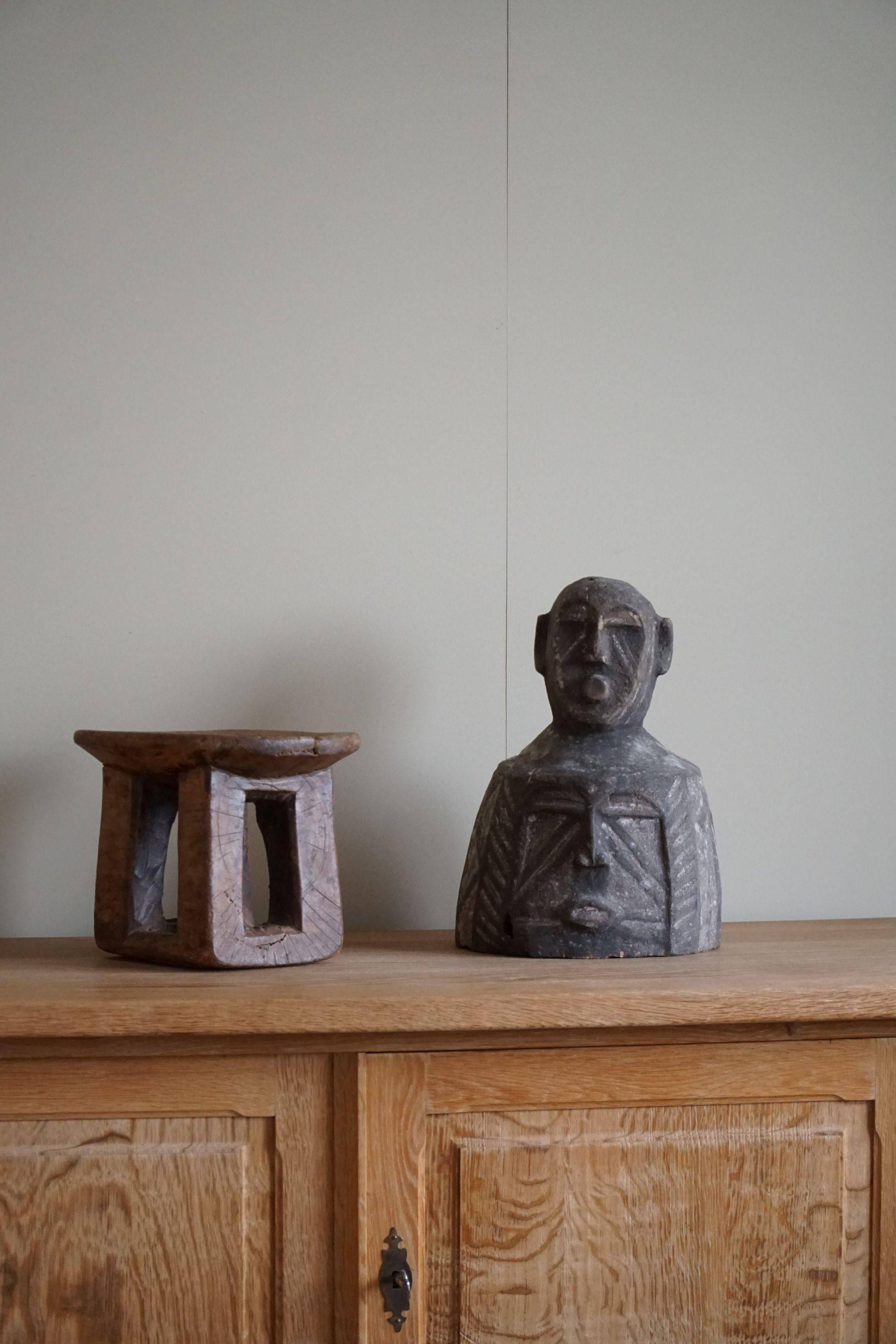 Mid-century decorative African wooden sculpture, made in the 1940s-50s.