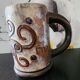 Chopped stoneware mug signed Dubois, vintage ceramic engraved with spirals, height 17cm.