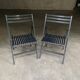 Pair of black folding chairs