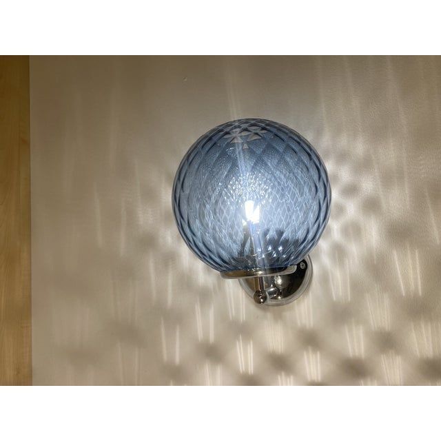 Contemporary "ballotton" blue murano glass wall sconce
