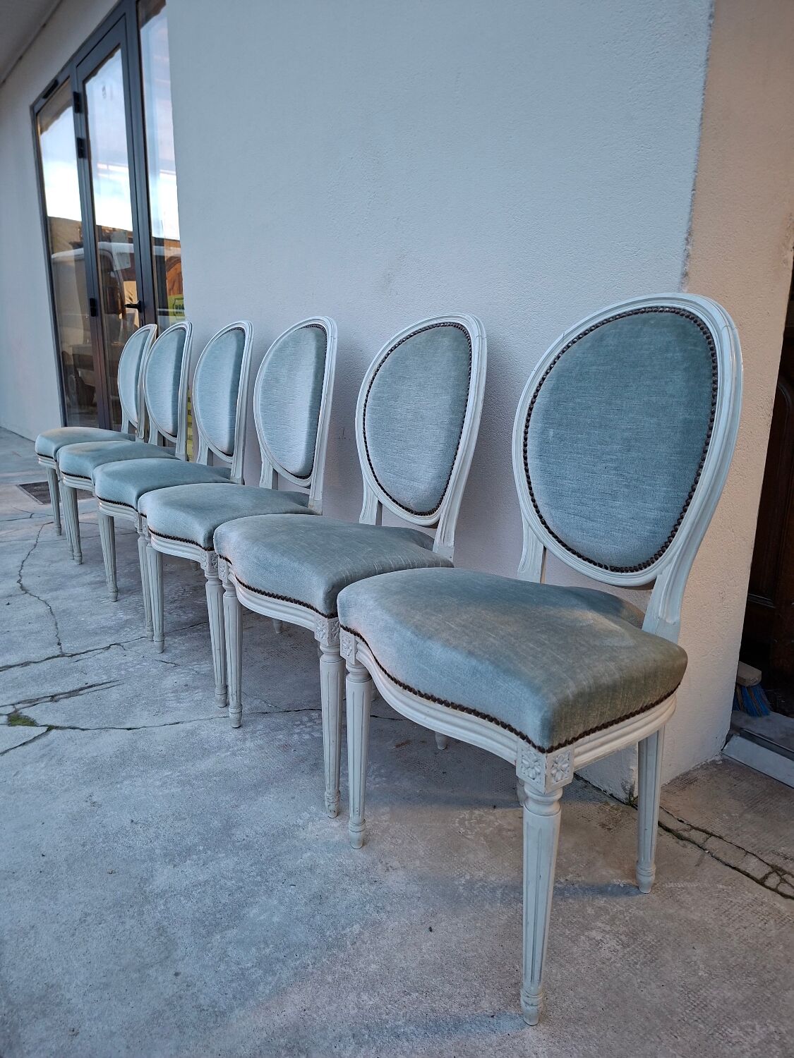 Set of 6 Louis XVI style patinated medallion chairs.