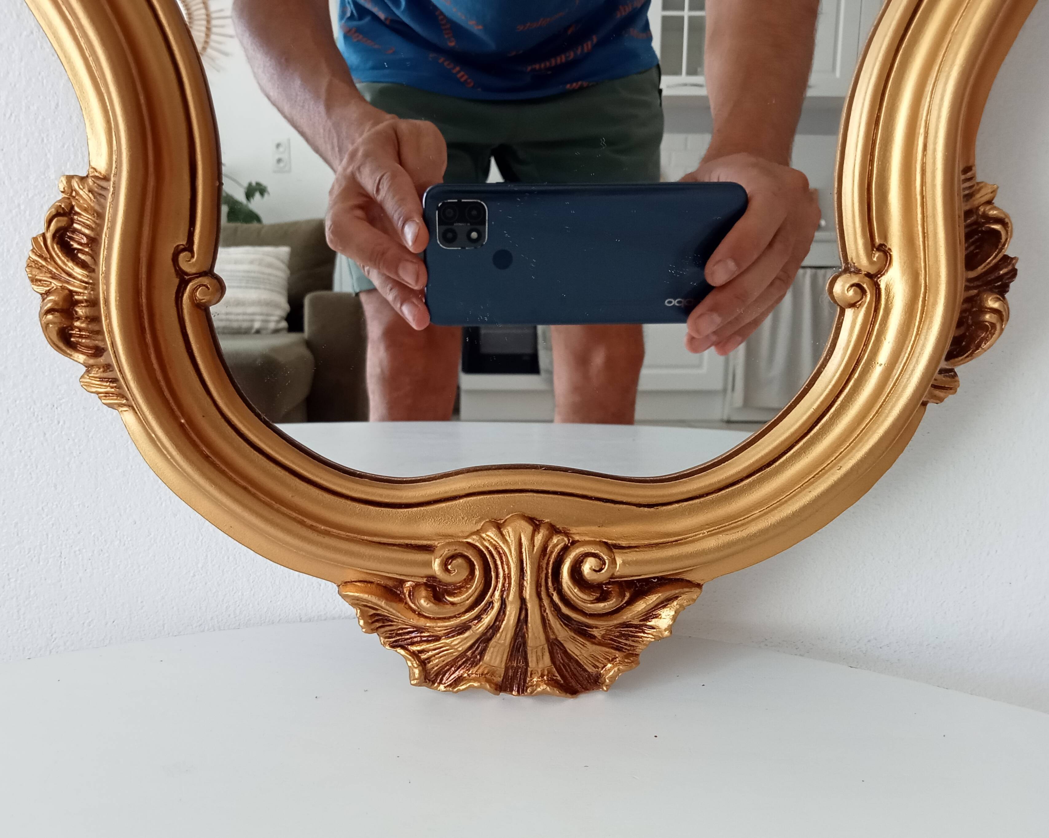 Vintage rococo mirror in gilded resin