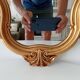 Vintage rococo mirror in gilded resin