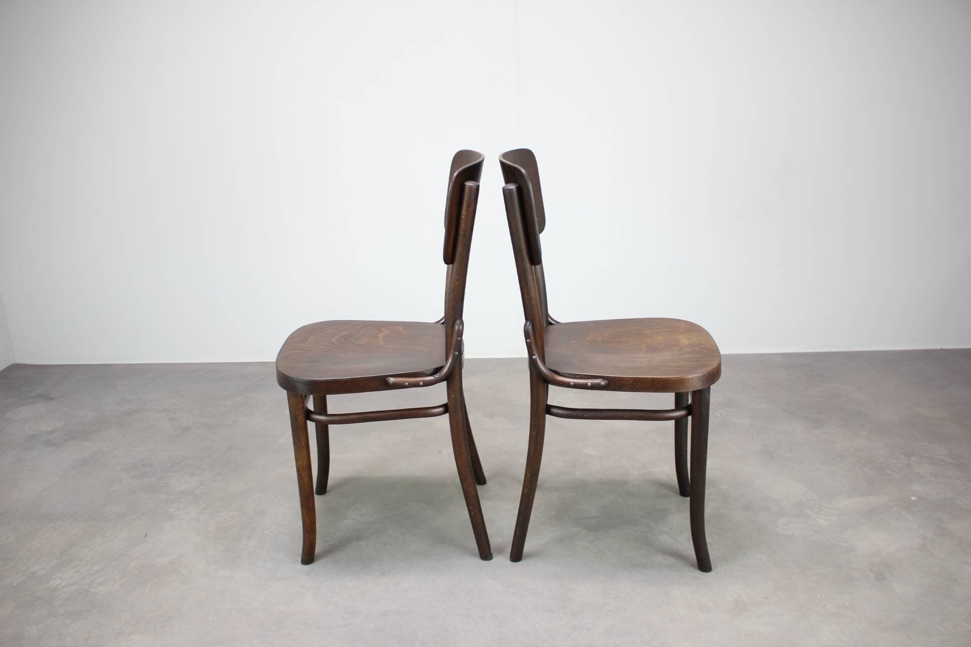 Pair of antique armchairs Model No B28 by Thonet, bent wood and caning, Austria 1920s.