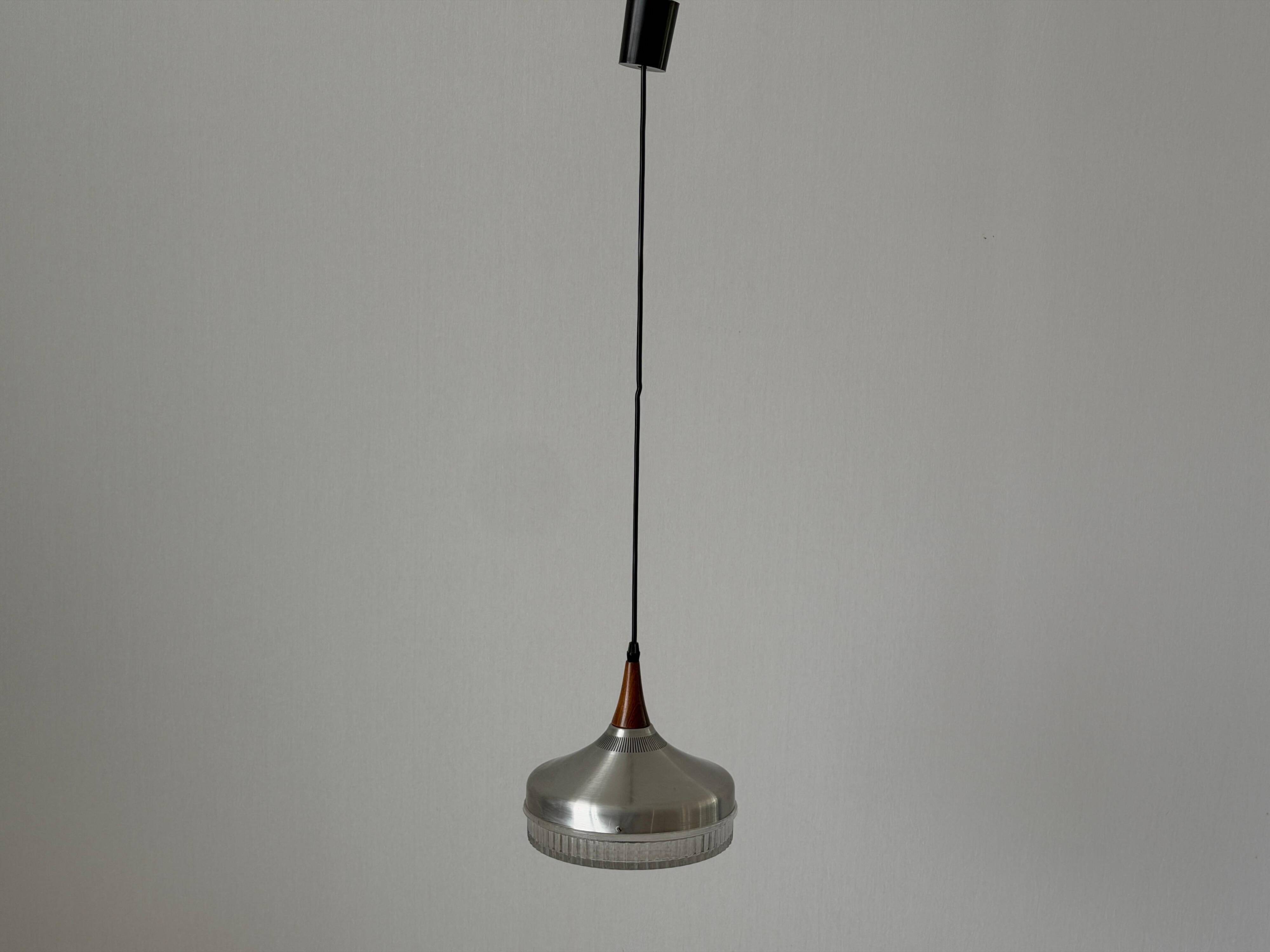 Crystal glass ceiling light with a metal frame and wood details, 1960s, Germany.