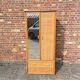 Large rattan wardrobe with mirror