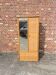 Large rattan wardrobe with mirror
