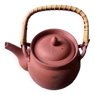 Terracotta and rattan teapot