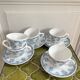 5 coffee cups with blue flower decor from the 70s