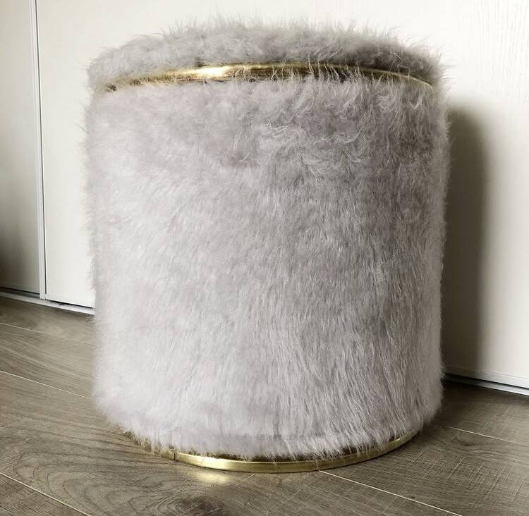 Vintage brass pouf with fur.
