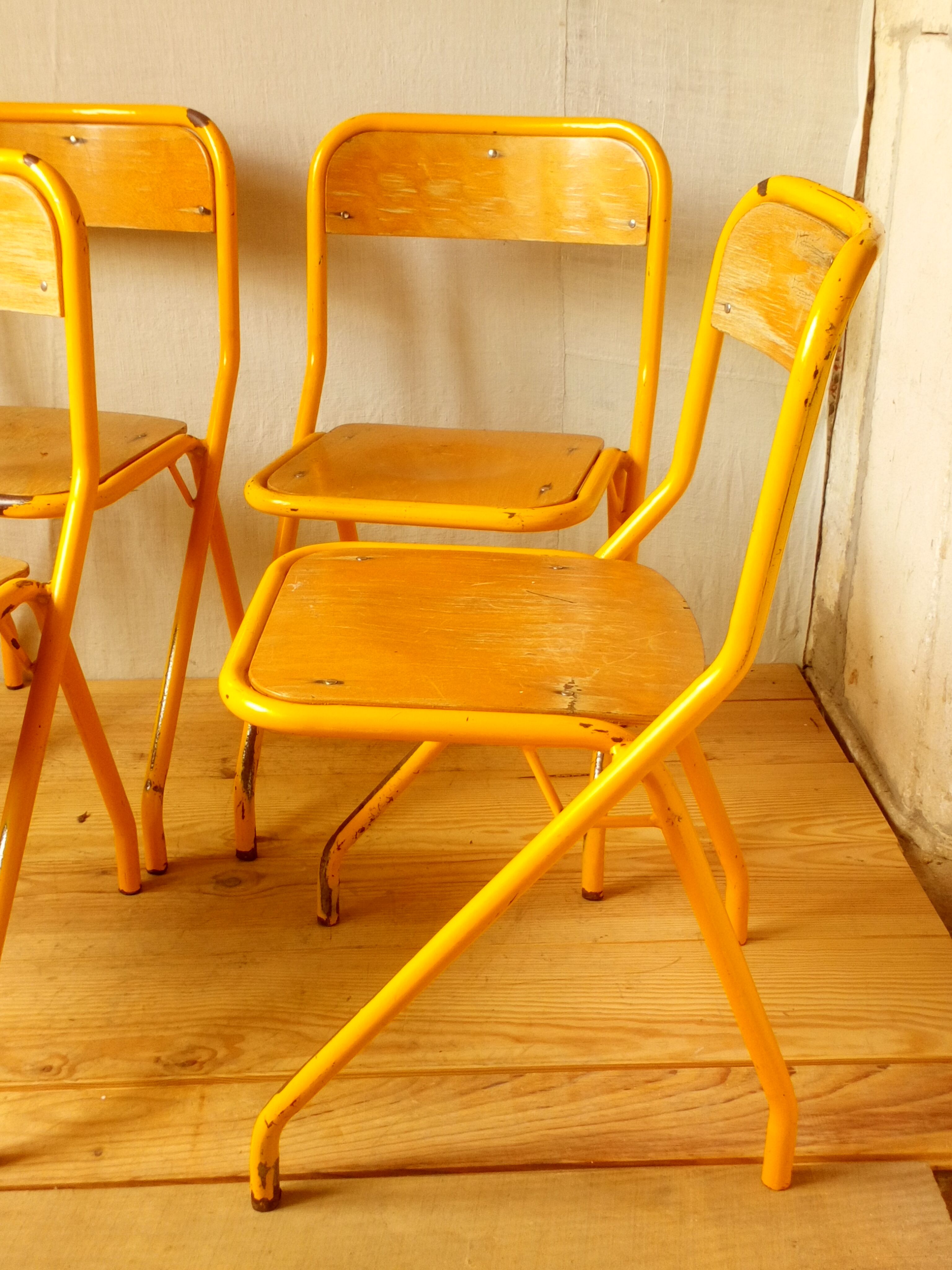 Four school chairs