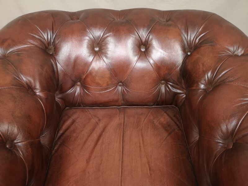 Brown brown leather chesterfield armchairs