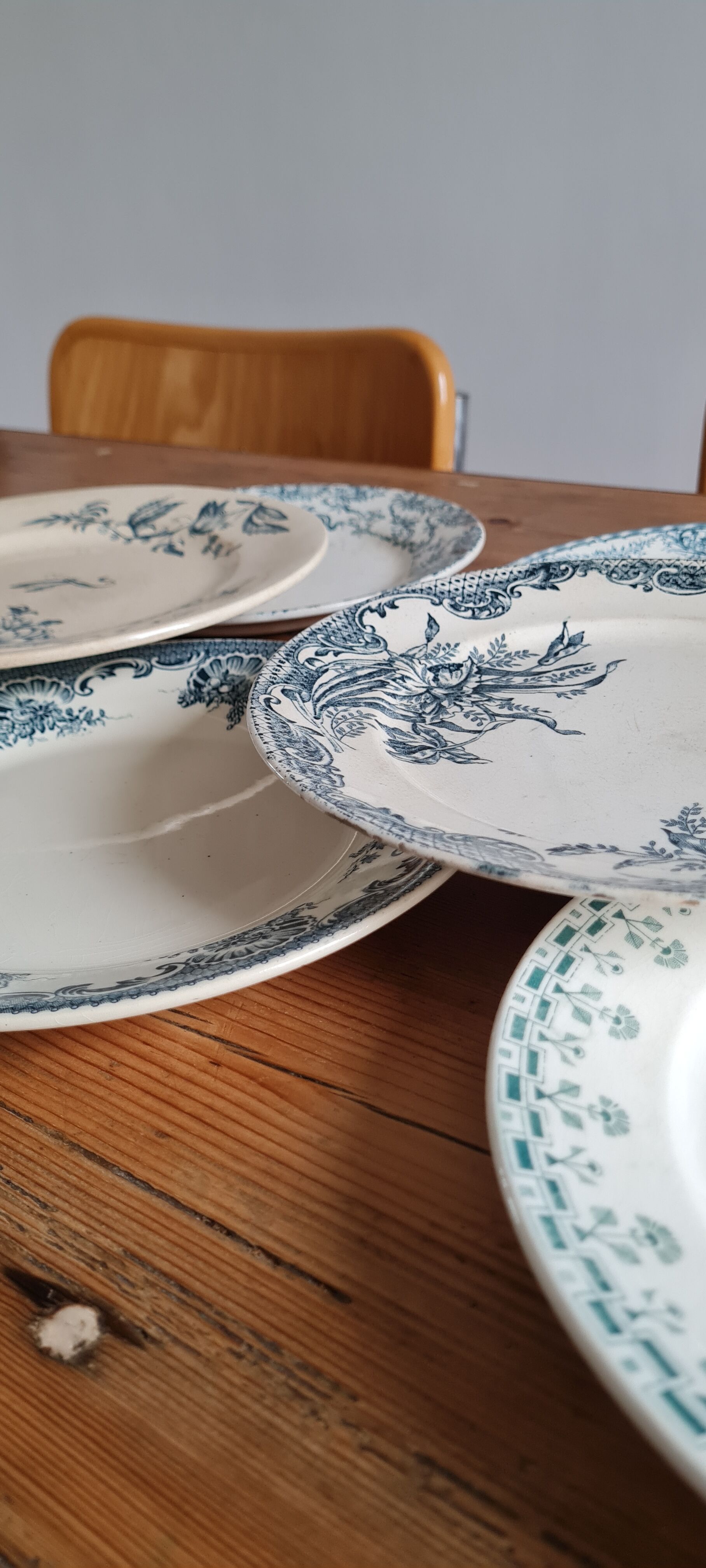 Set of 7 mismatched plates in iron earth