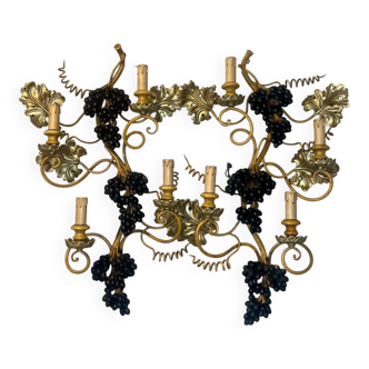 Large pair of wall sconces with vine decorations.