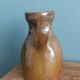 Rustic stoneware jug, chic countryside.