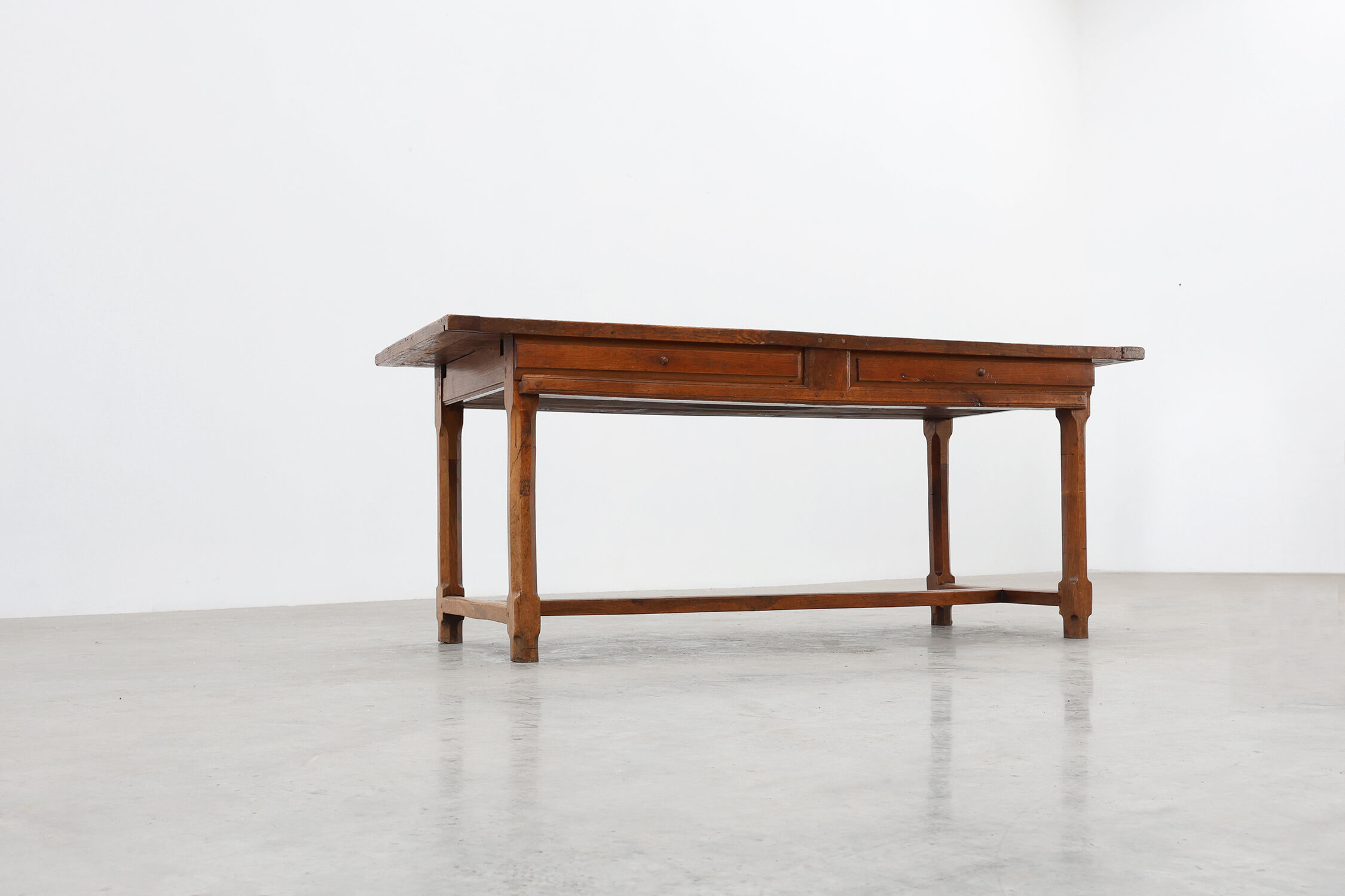 Rustic 19th century oak dinner table with drawers opening laterally, France