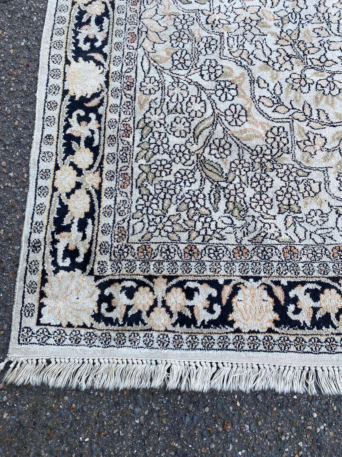 Handmade beige wool Persian rug 130x200