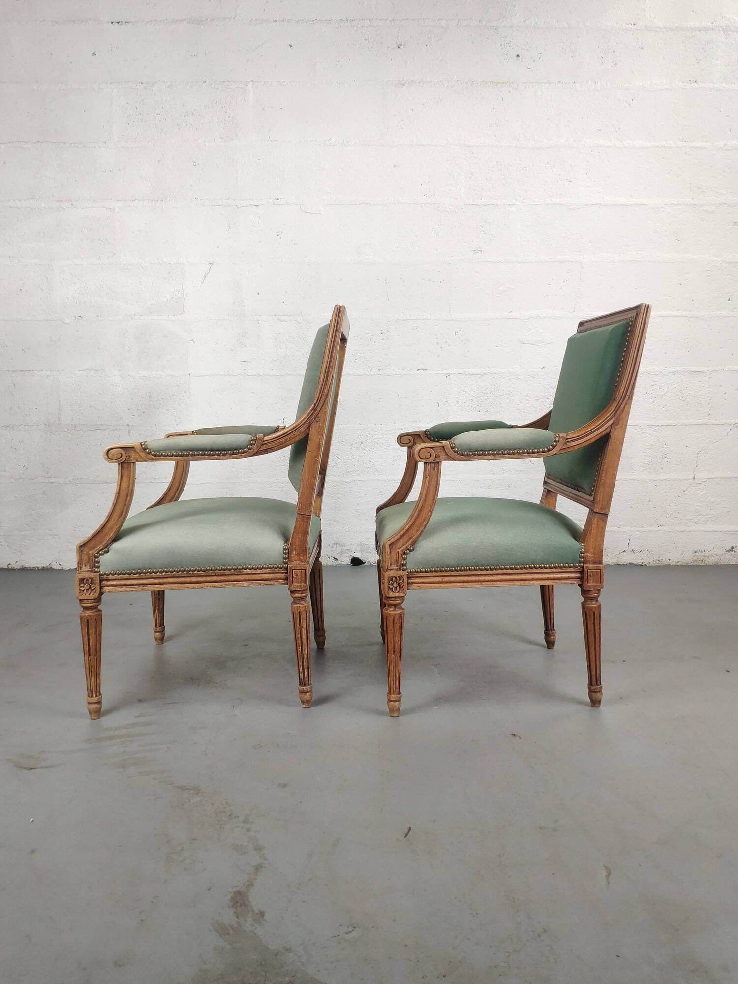 Pair of Louis XVI armchairs upholstered green velvet