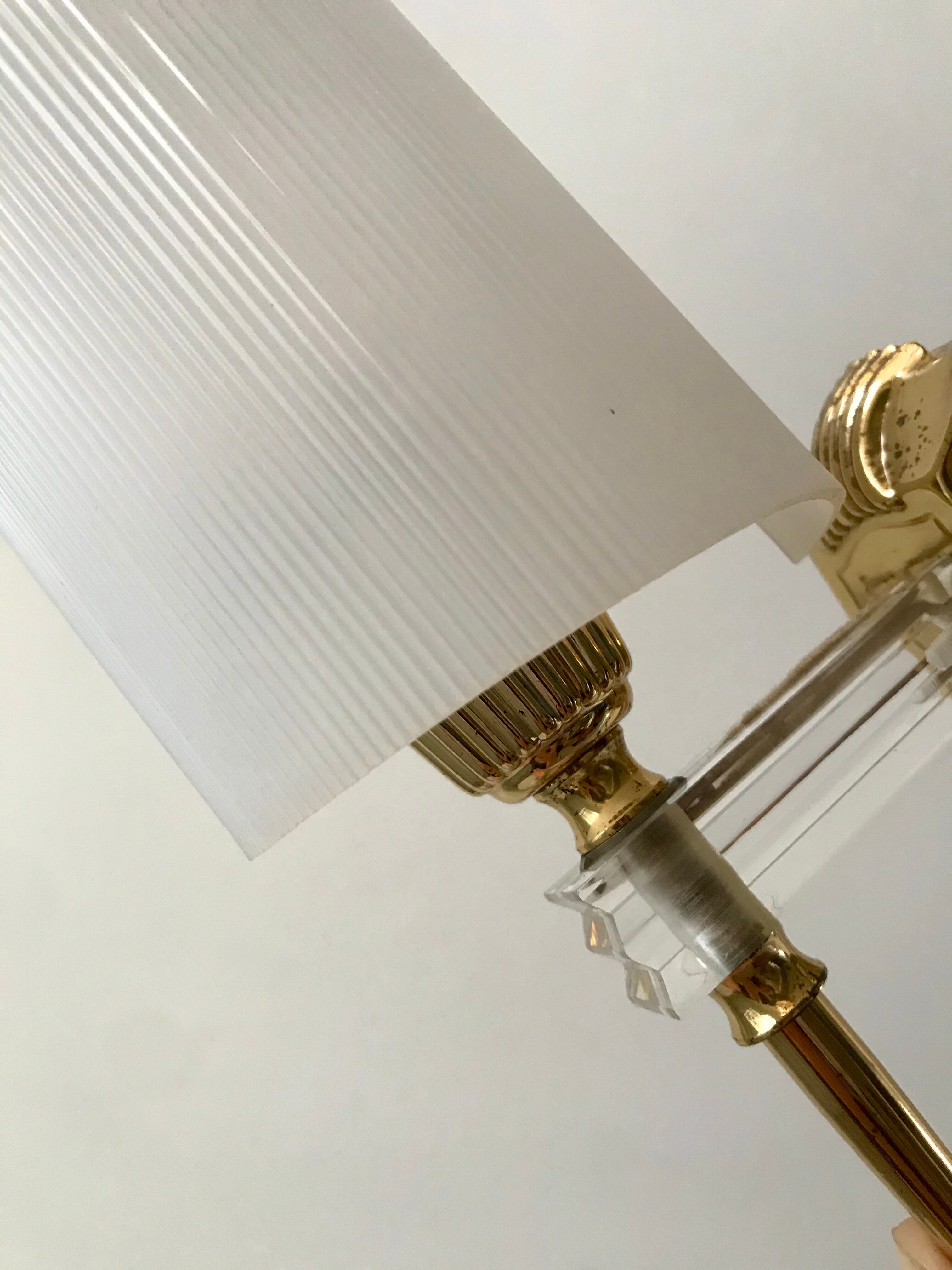 Pair of gold steel wall lamps, plexi and pleated plastic shades 60s-70s