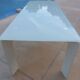 Long modern coffee table in glass and off-white metal - as new.