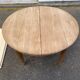 Renovated round Art Deco dining table, extendable, made of solid oak, 213cm.