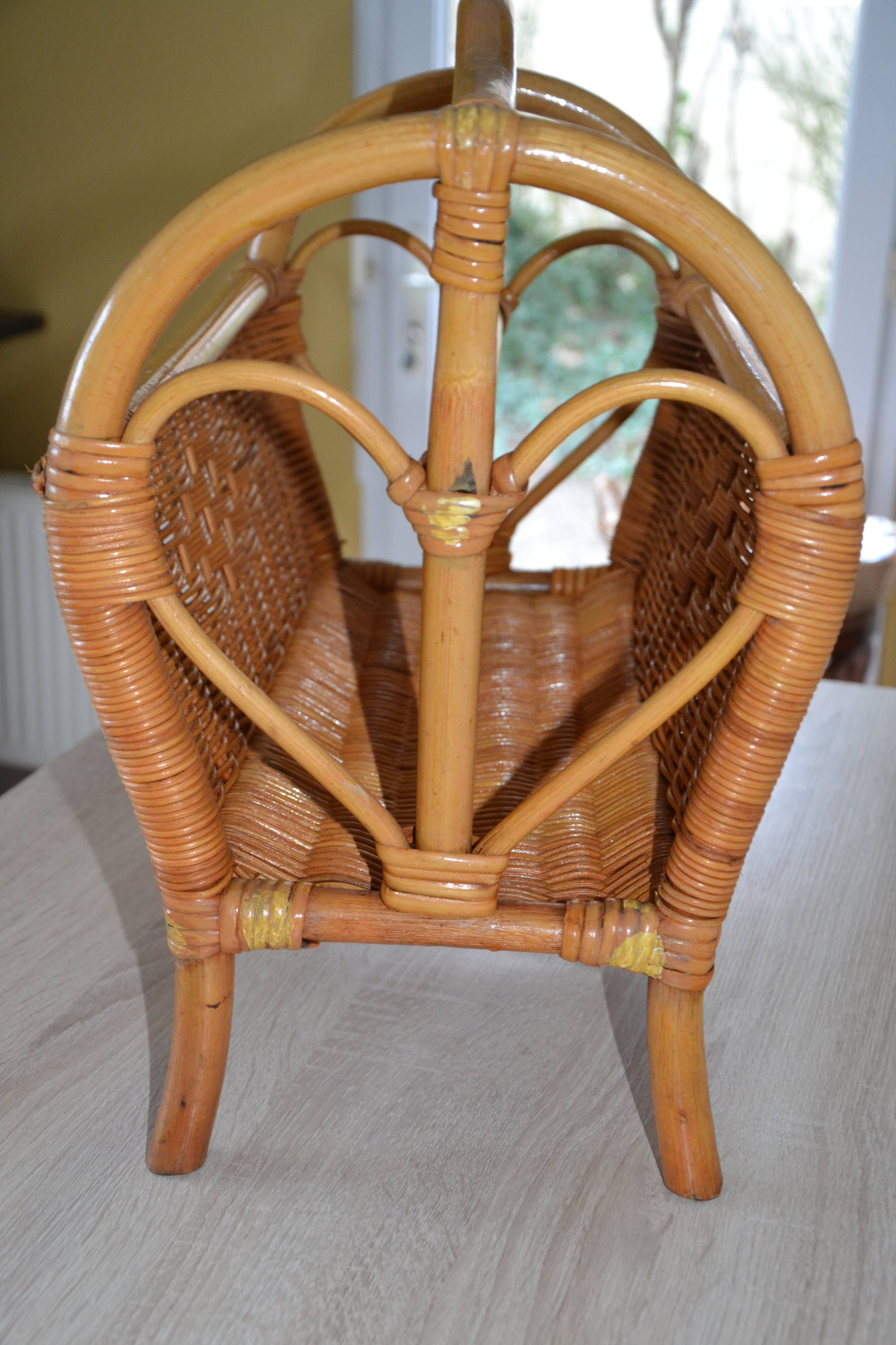 Vintage woven rattan magazine rack
